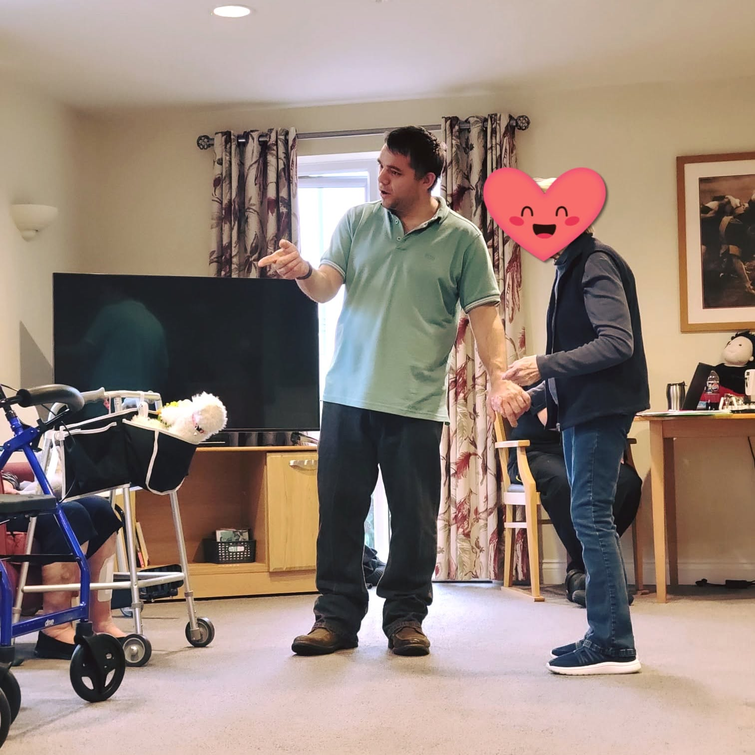 Alex running a Memory Club session with a care home resident